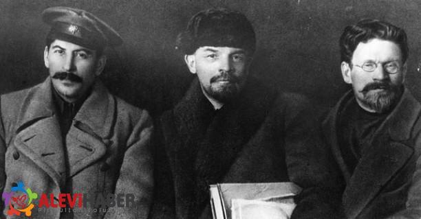 Russian revolutionaries and leaders Joseph Stalin (1879 - 1953), Vladimir Ilyich Lenin (1870 - 1924), and Mikhail Ivanovich Kalinin (1875 - 1946), at the Congress of the Russian Communist Party.    (Photo by Hulton Archive/Getty Images)